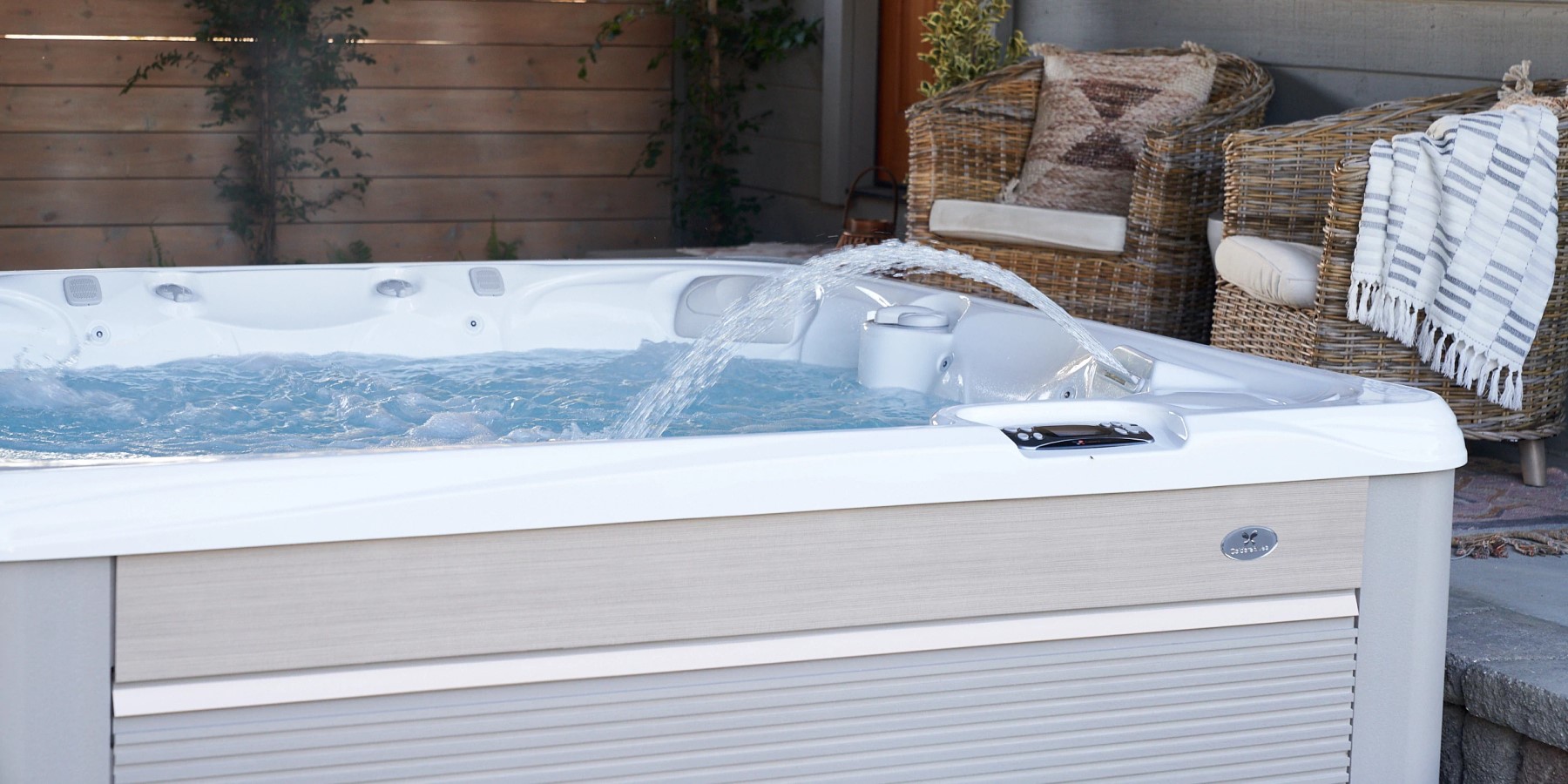 Caldera Spas hot tub in a comfortable secluded patio setting